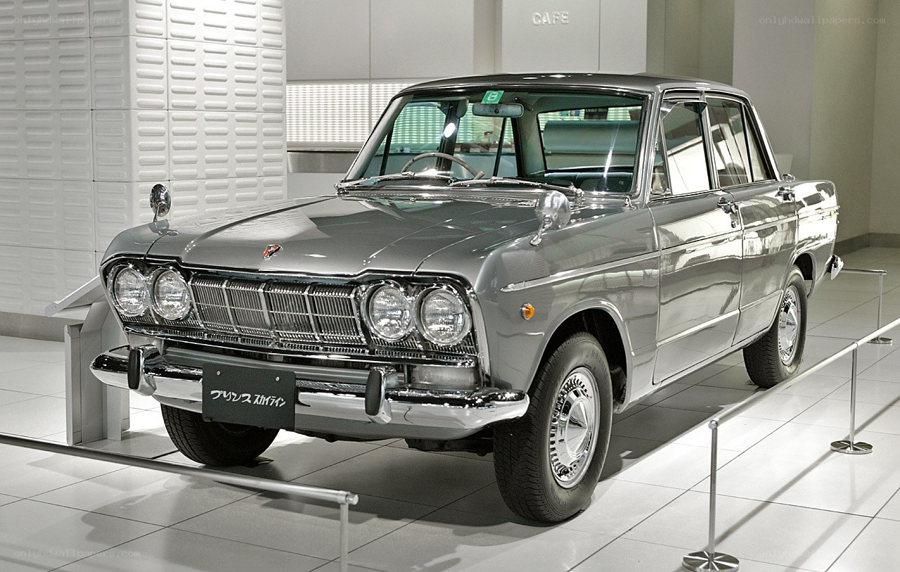 Classic silver sedan on display