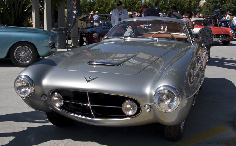 Classic silver sports car at show
