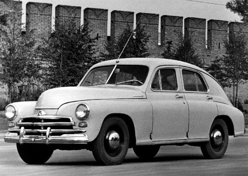 Classic Soviet car in front of a wall