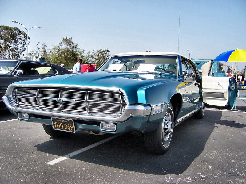 Classic teal car at a show