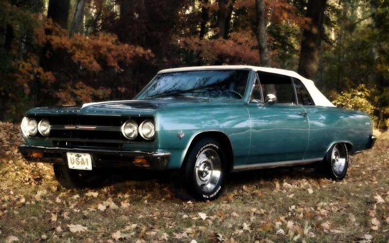 Classic teal convertible in autumn