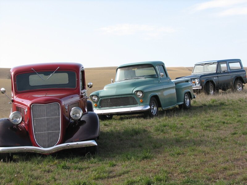 Classic trucks in a field