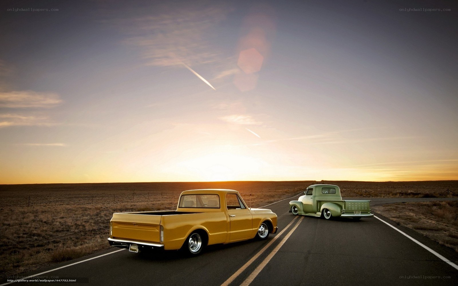 Classic trucks on a desert road