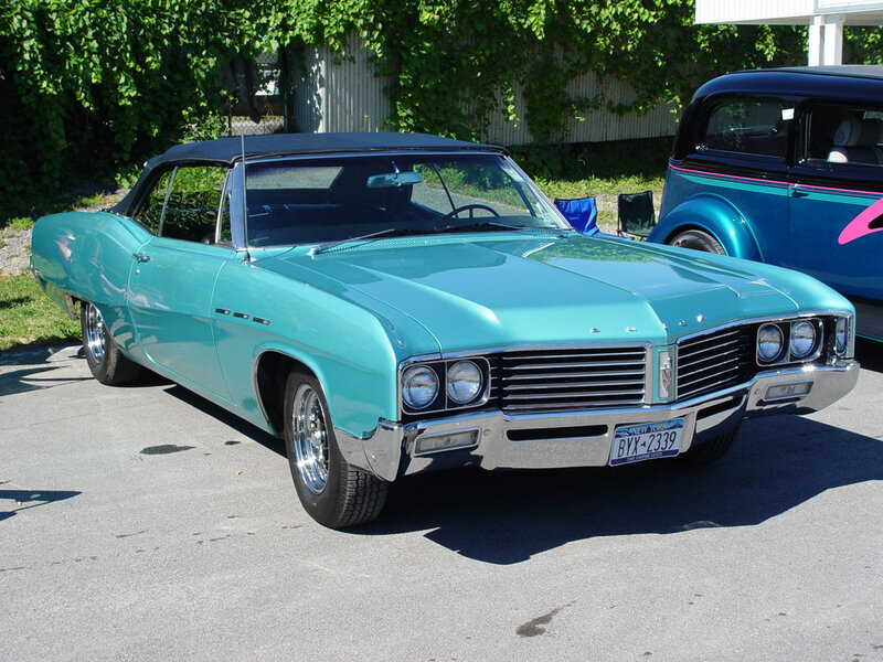 Classic turquoise Buick convertible