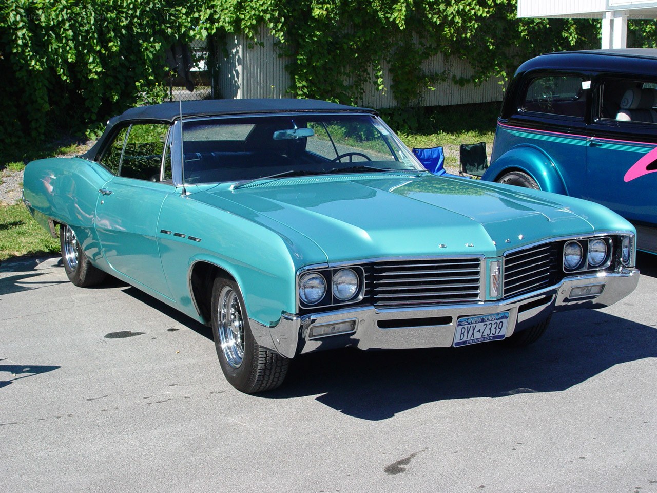 Classic turquoise Buick convertible
