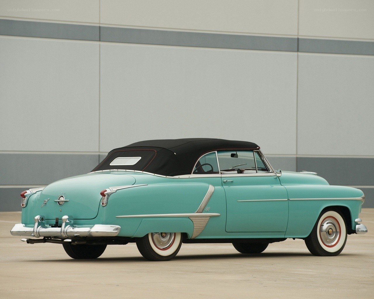 Classic turquoise convertible car