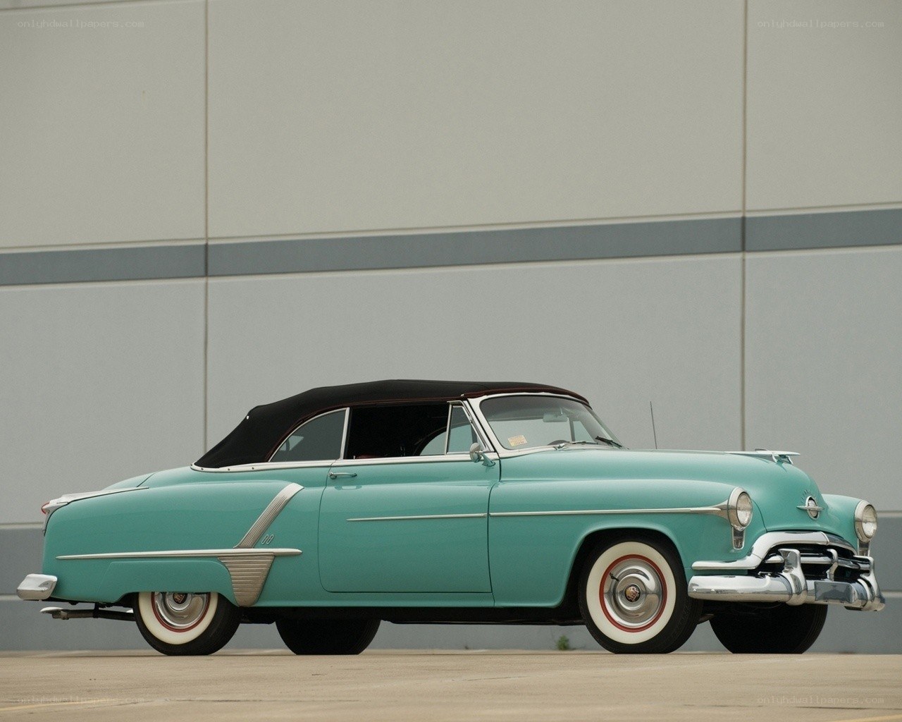 Classic turquoise convertible car