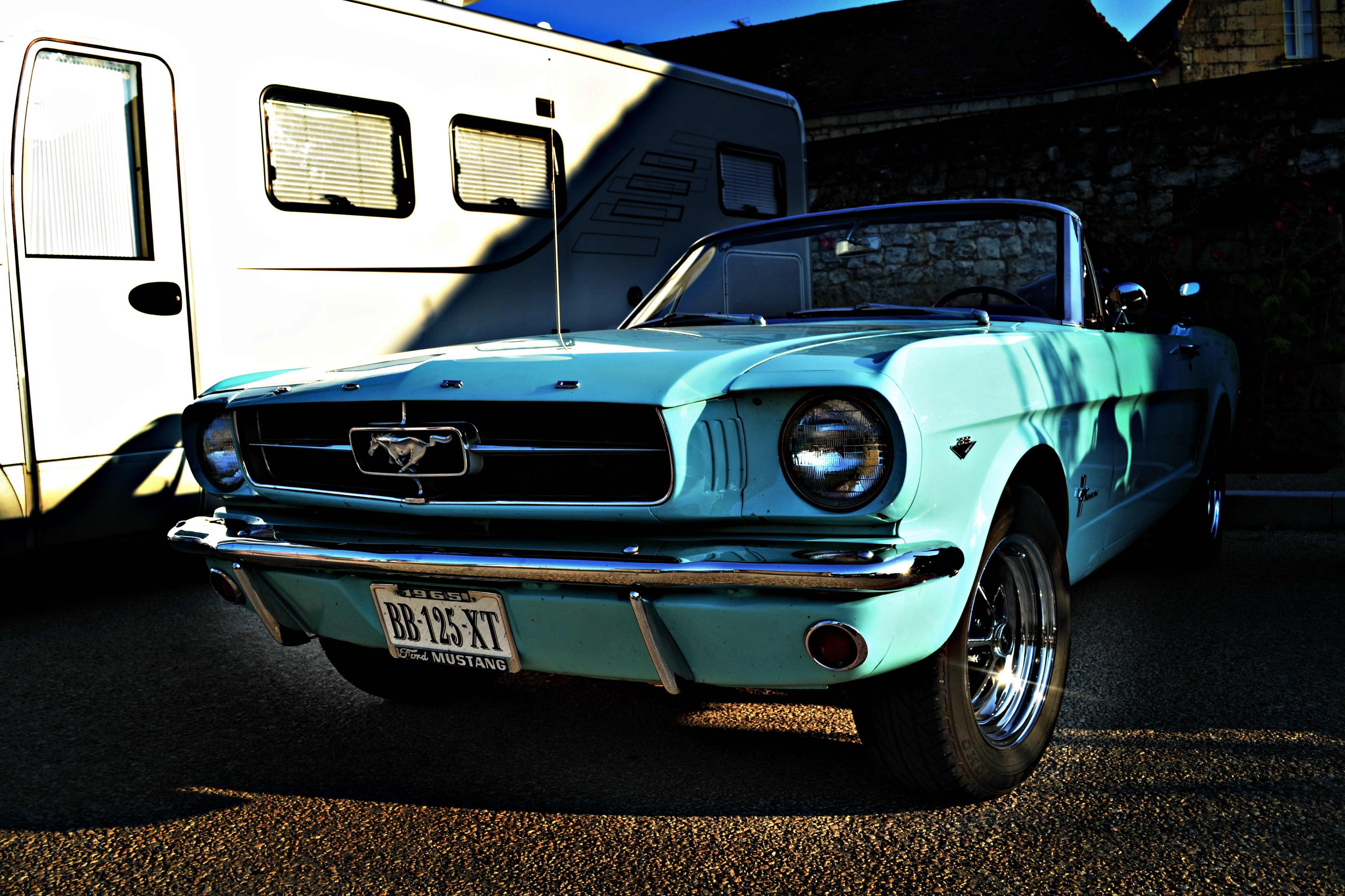 Classic turquoise Mustang convertible
