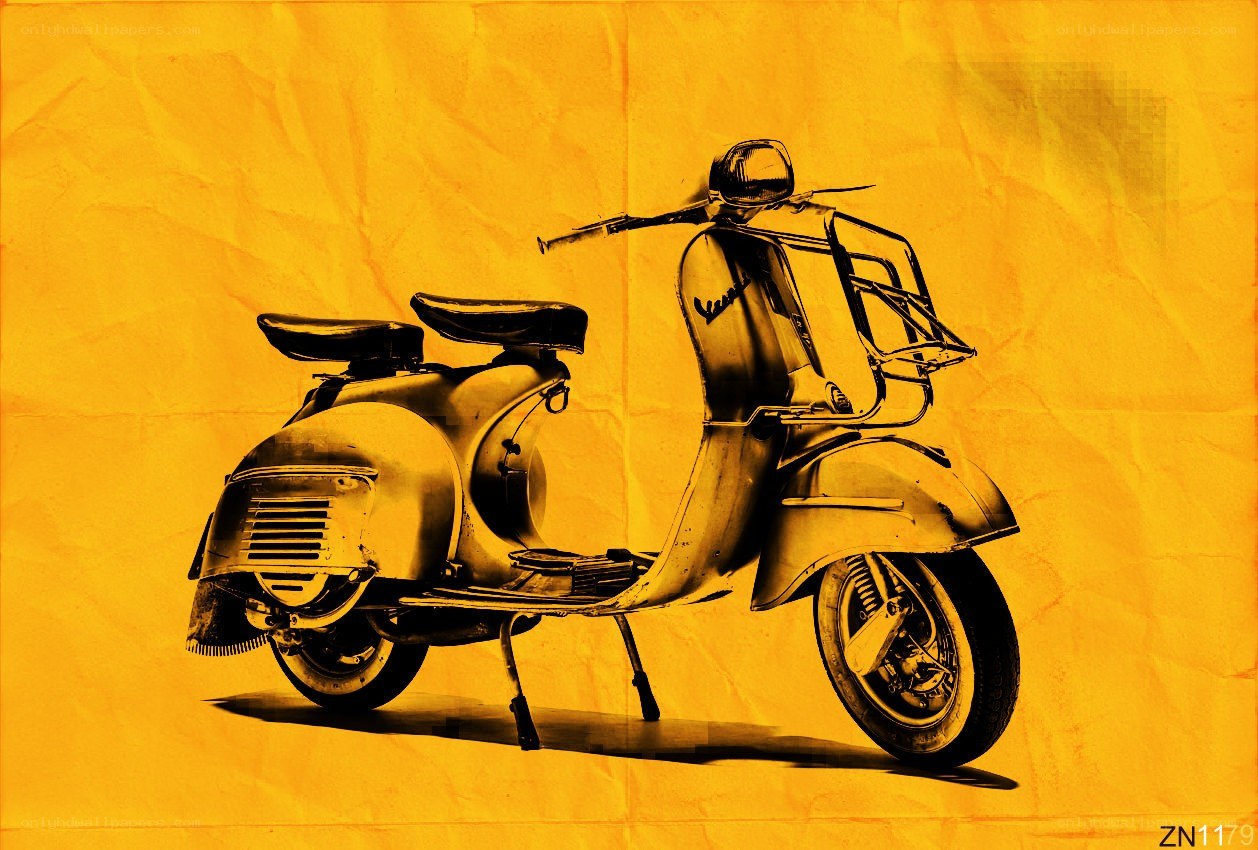 Classic Vespa scooter on yellow