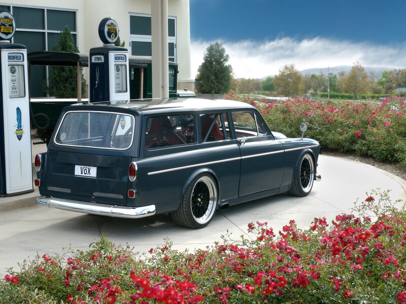 Classic Volvo station wagon at gas station
