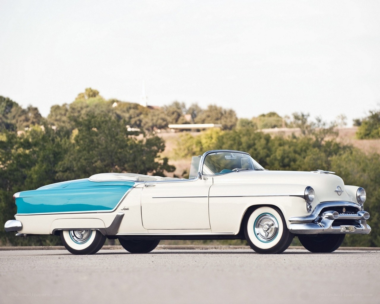 Classic white and teal convertible