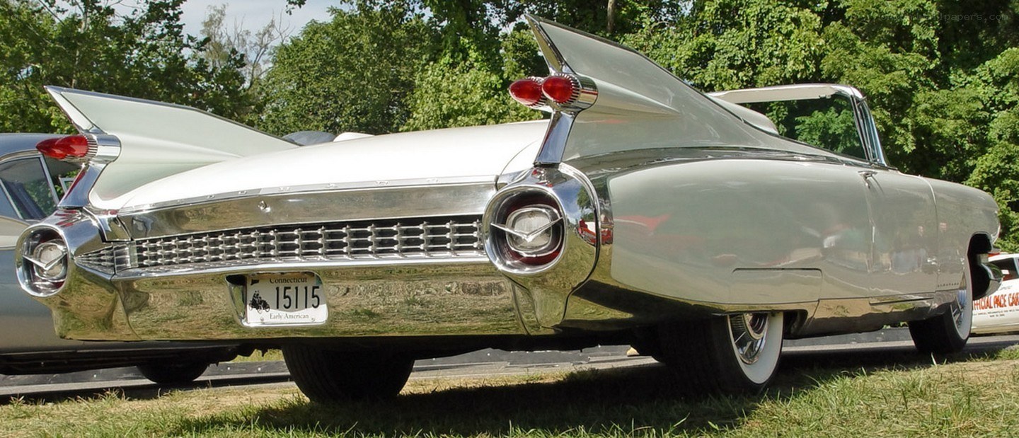 Classic white Cadillac with tailfins