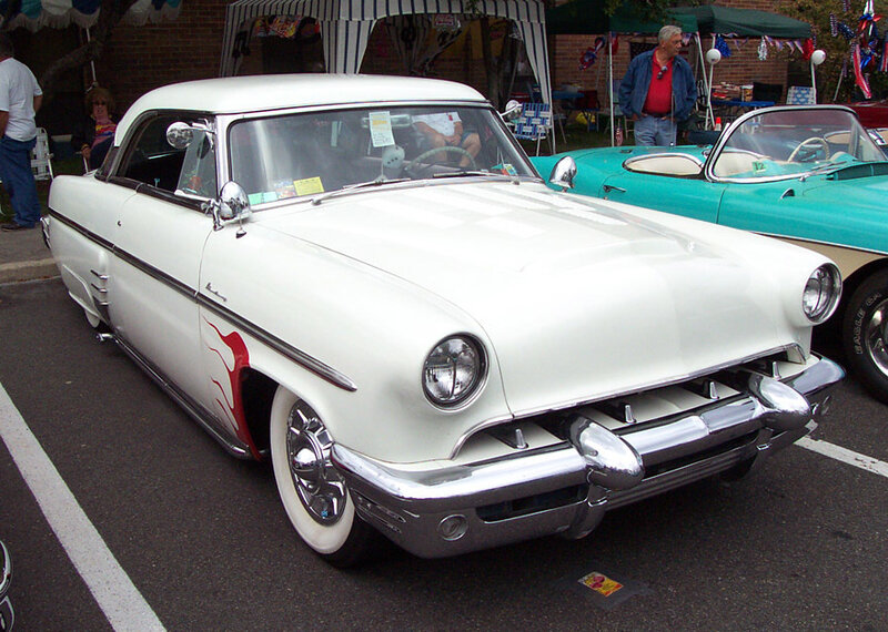 Classic white car at a show