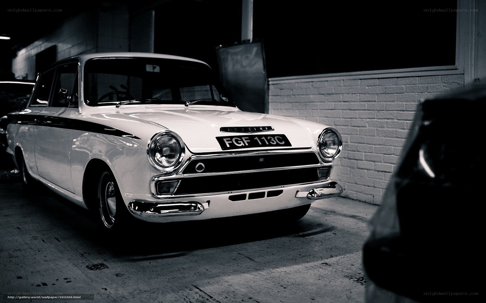 Classic white car in garage