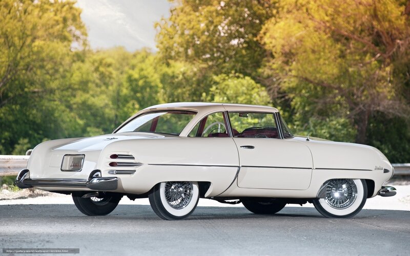 Classic white car on road