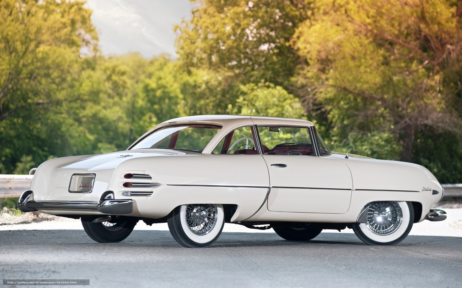 Classic white car on road
