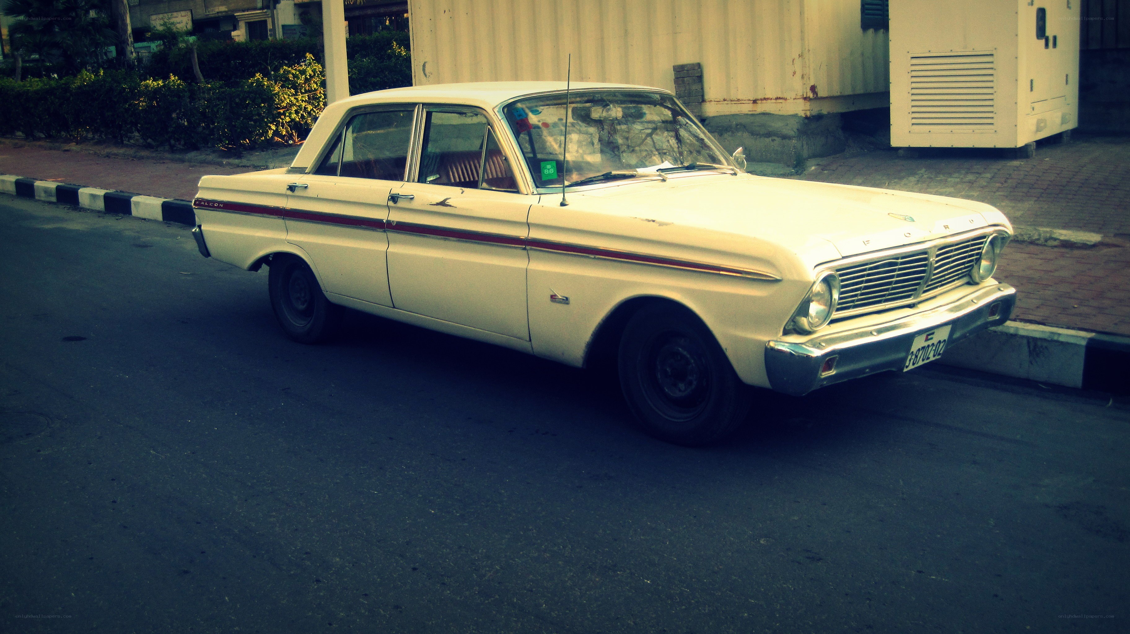 Classic white Ford Falcon parked