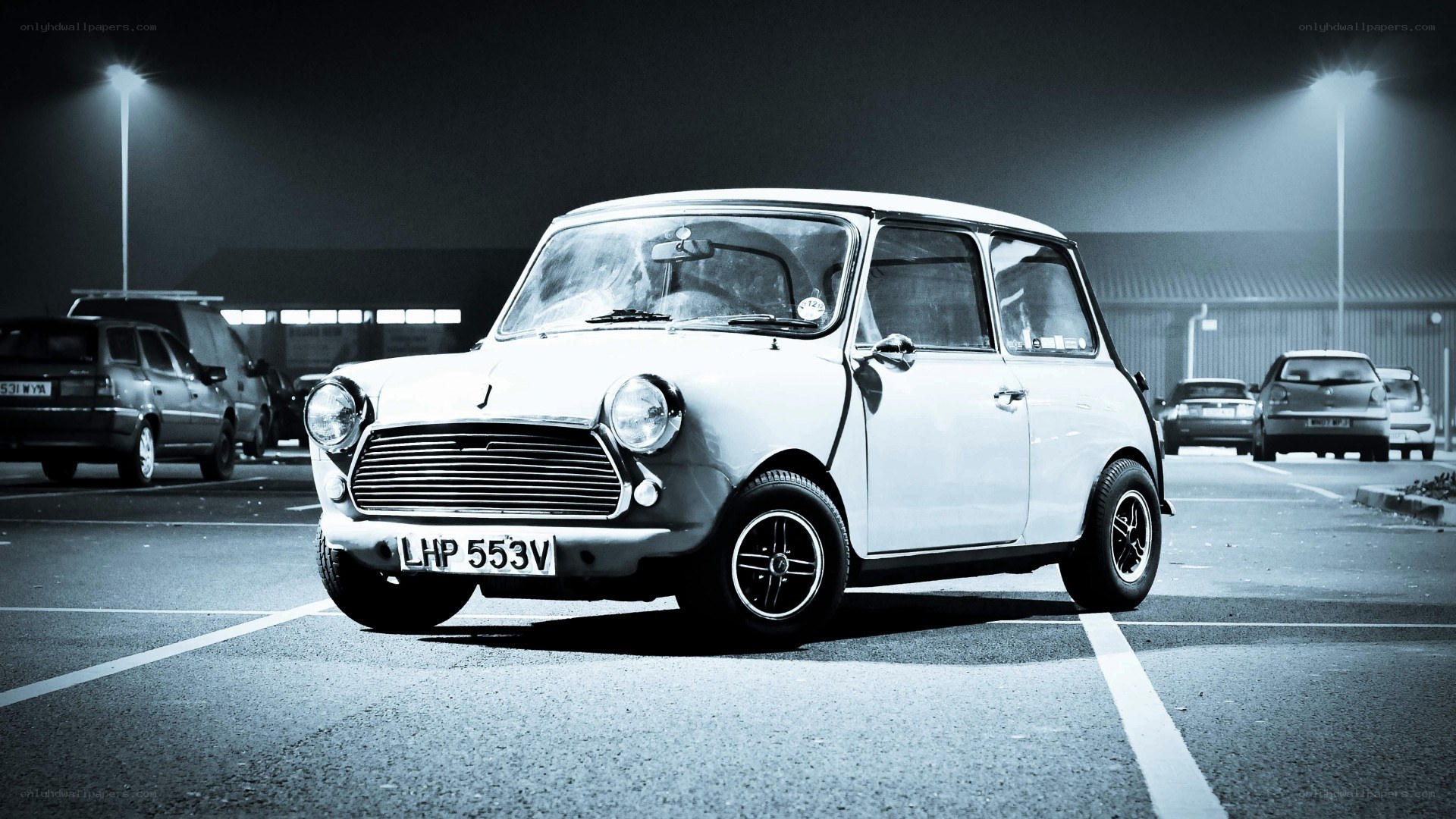 Classic white Mini in parking lot