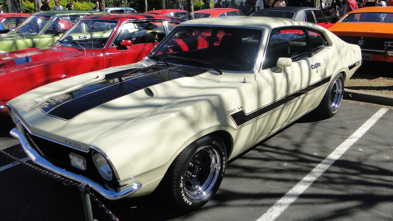 Classic white muscle car at a show