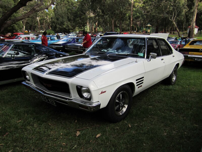 Classic white muscle car at a show