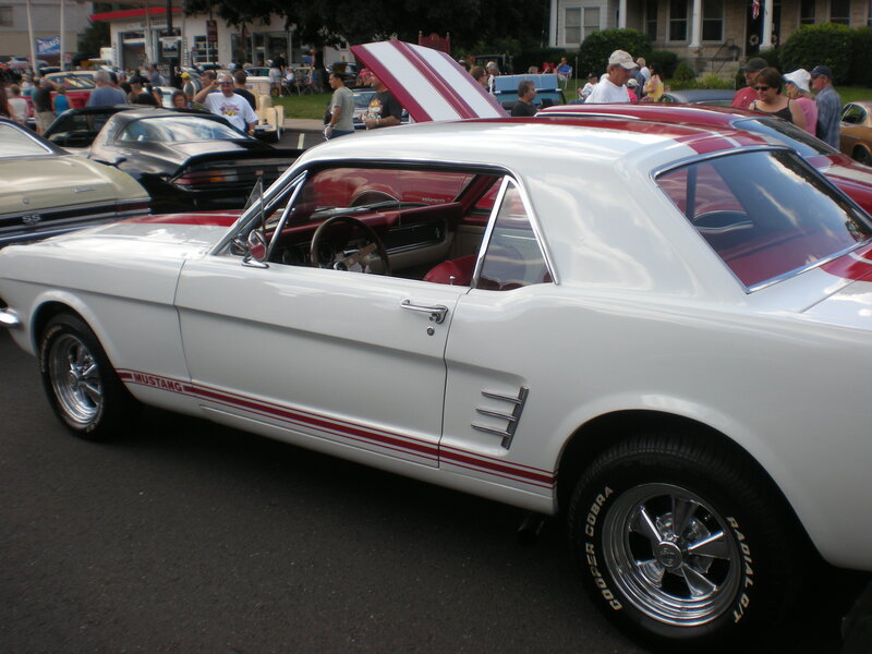 Classic white Mustang at car show