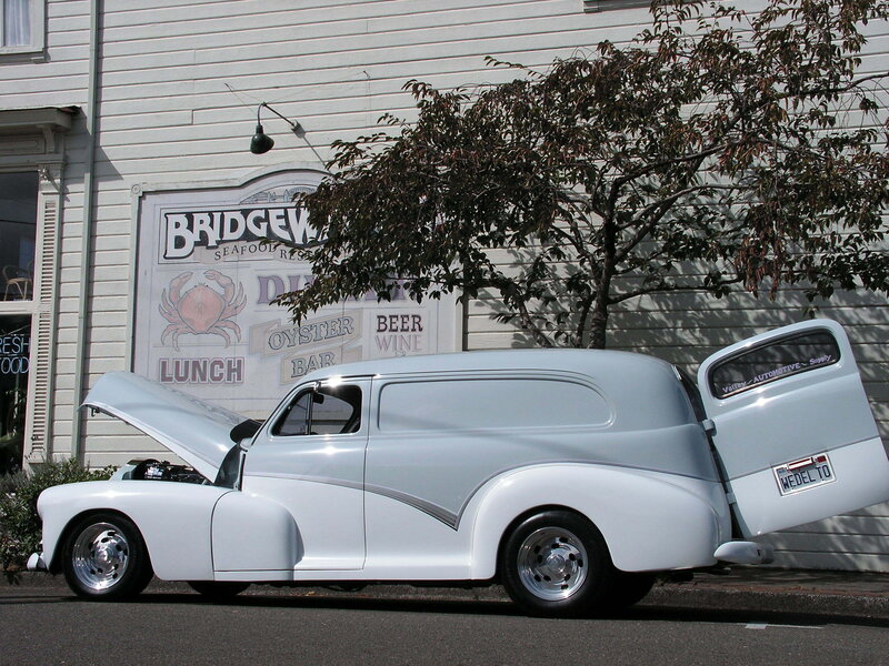 Classic white panel truck at restaurant