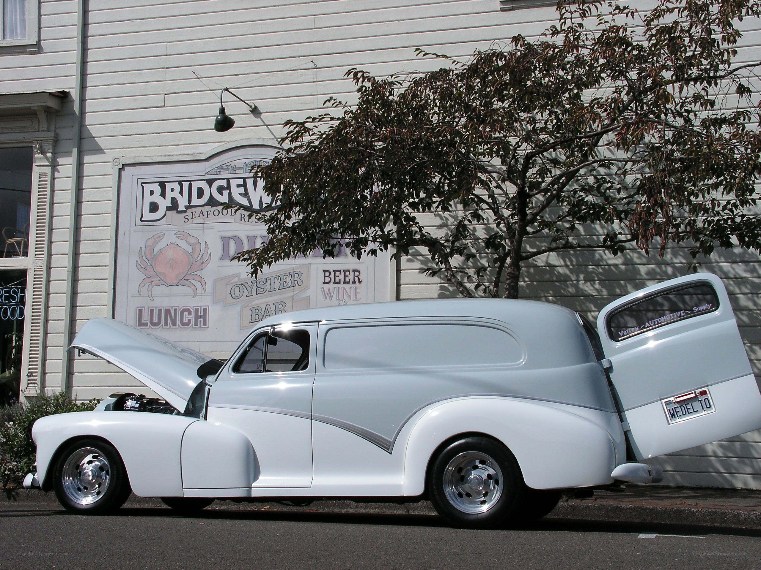 Classic white panel truck at restaurant