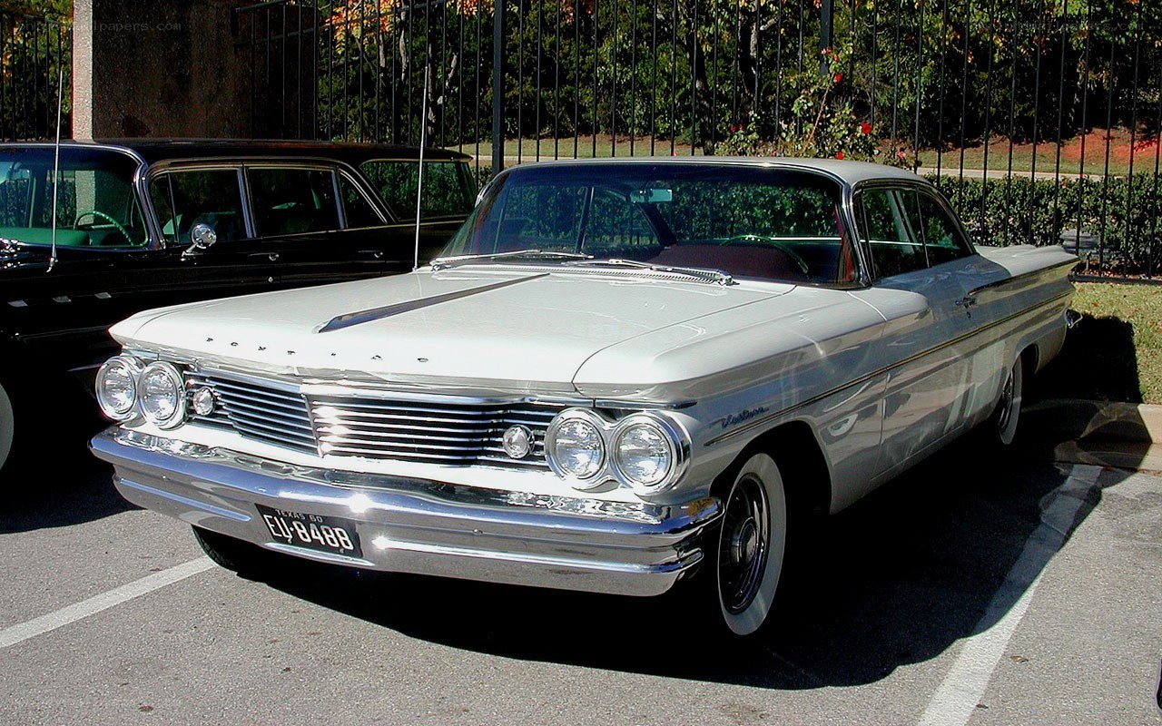 Classic white Pontiac sedan