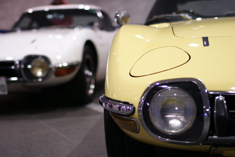 Classic yellow and white sports cars
