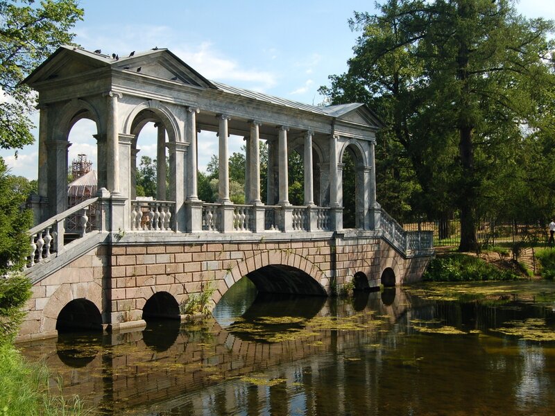 Classical bridge over a pond