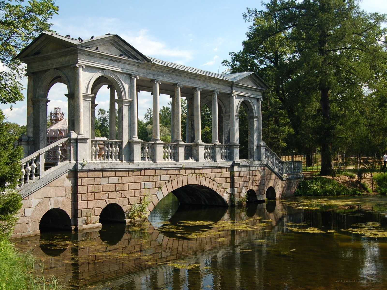 Classical bridge over a pond