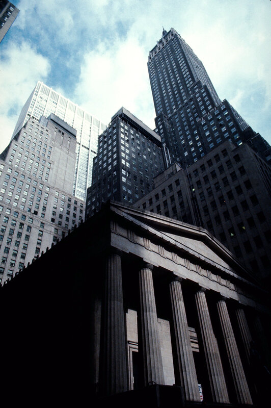 Classical building with skyscrapers