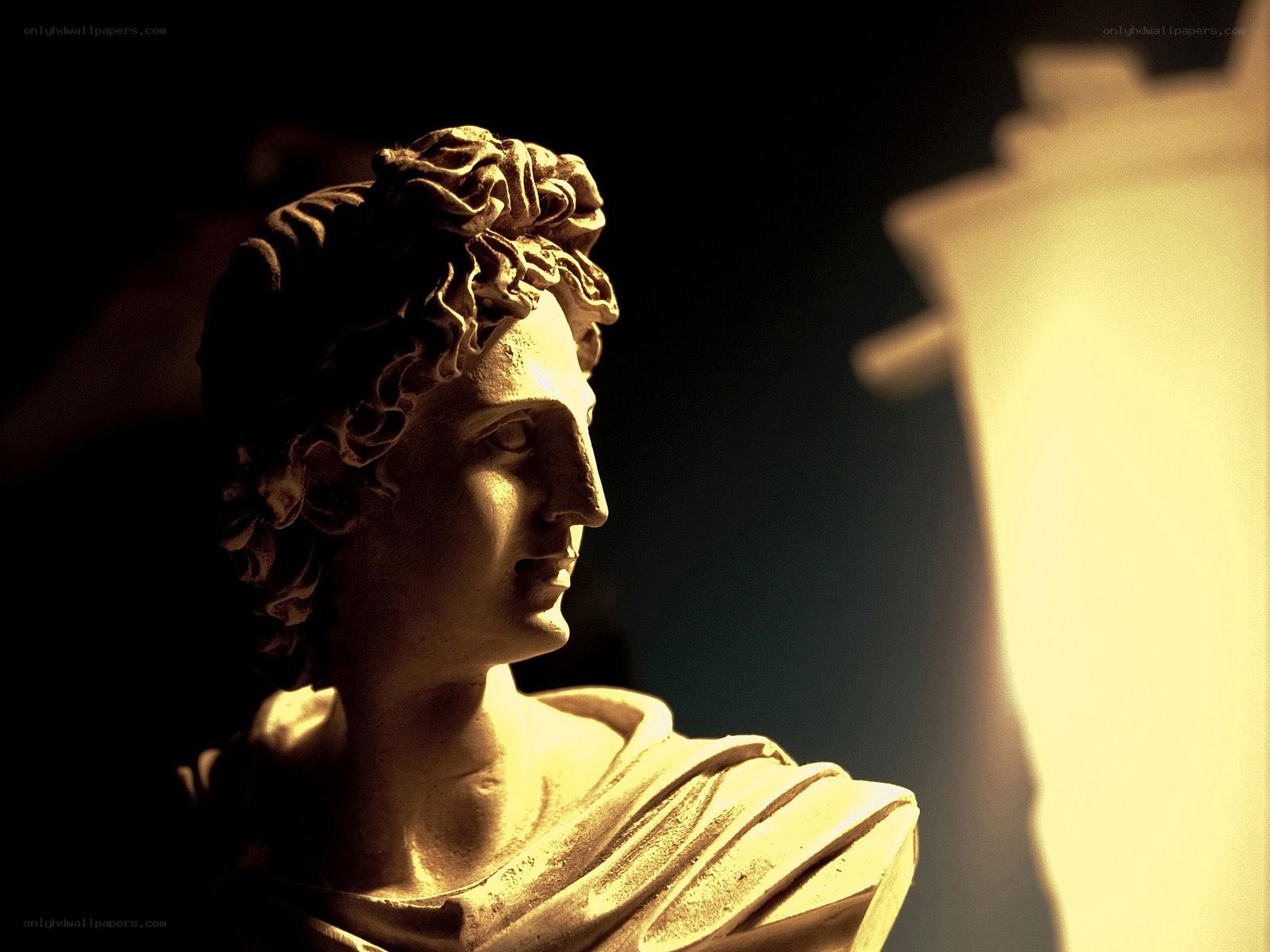 classical marble bust in golden light