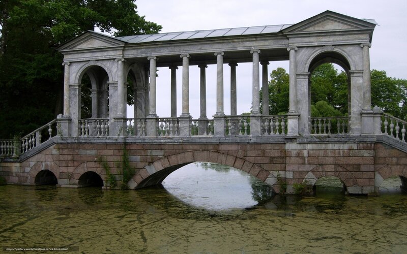 Classical stone bridge over water