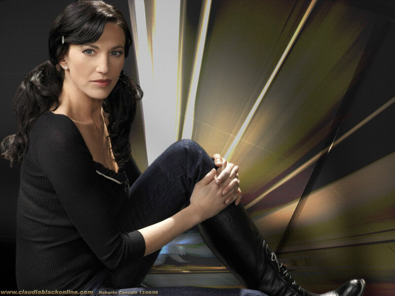 Claudia Black in black attire