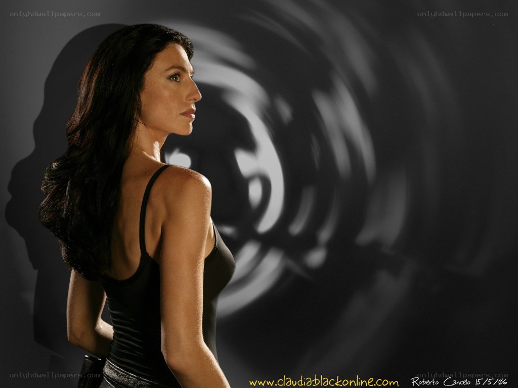 Claudia Black in black top