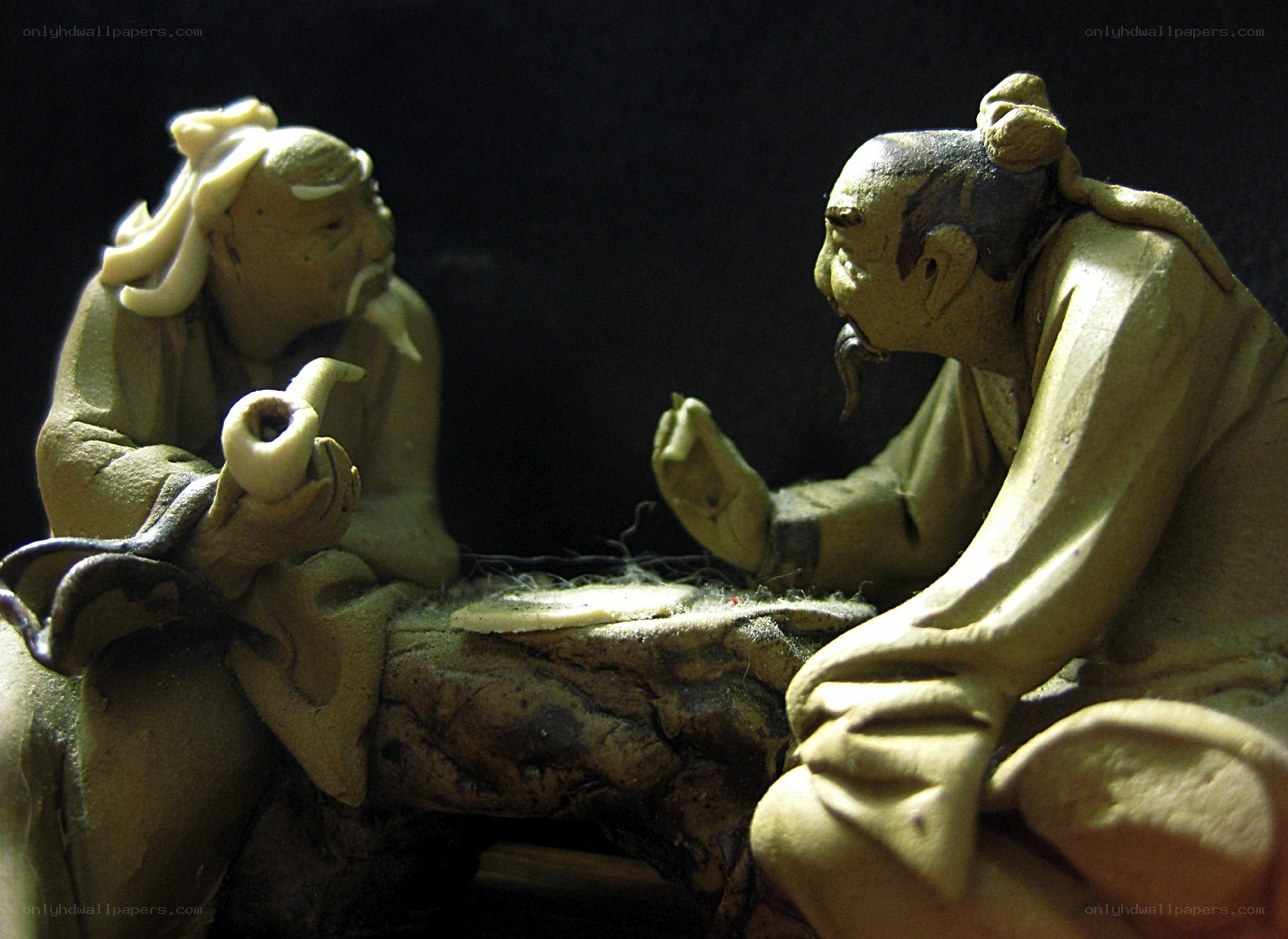 clay figurines playing game