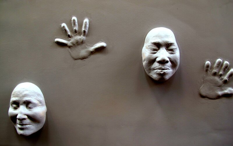 clay hand and face impressions