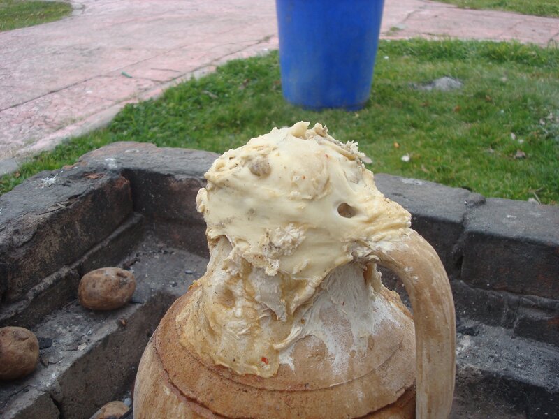 clay pot with food on top
