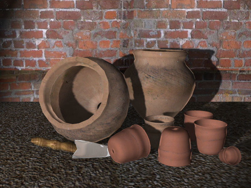 clay pots and tools on table