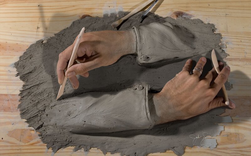 clay sculpture of hands