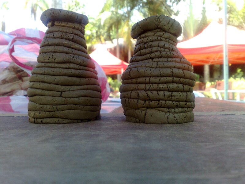 clay sculptures on a table