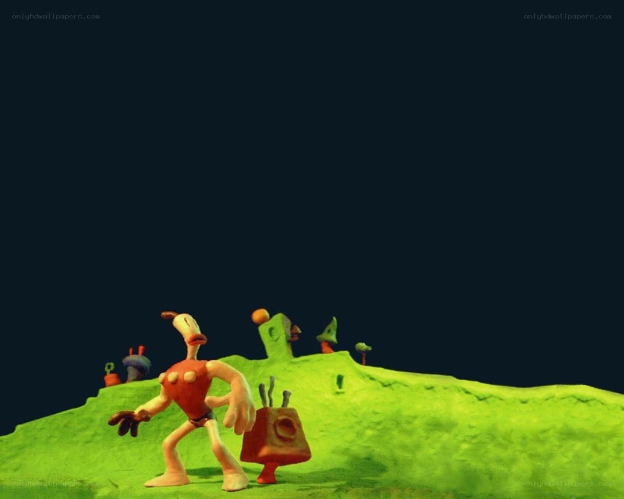 Claymation character on green hill