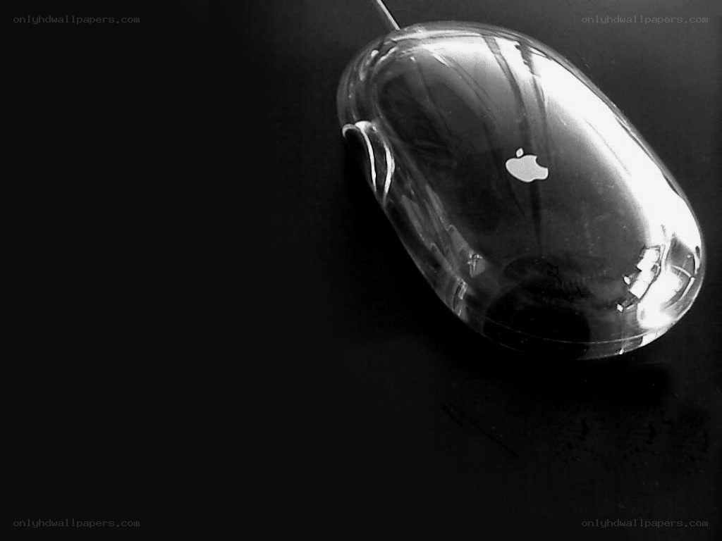 Clear Apple mouse on black