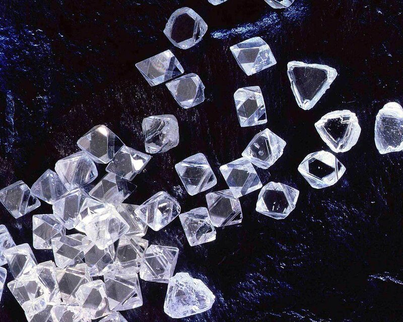 Clear crystals on dark surface