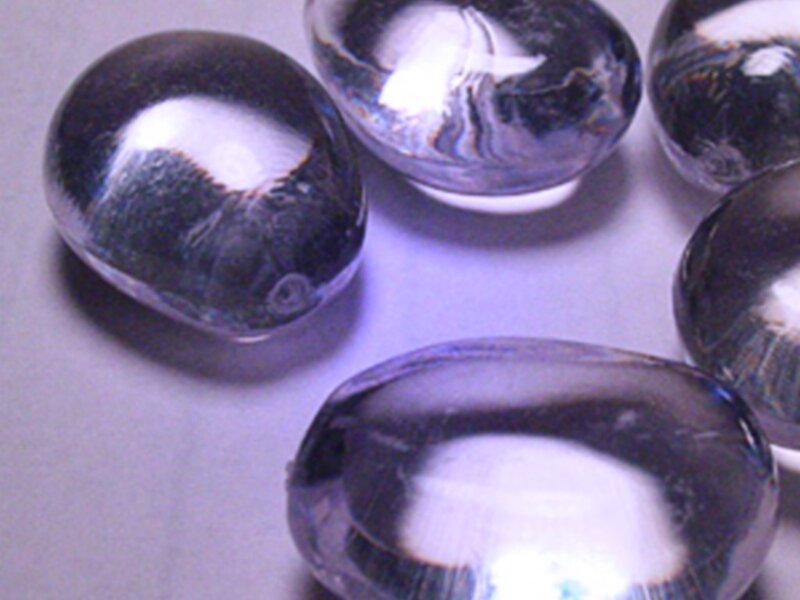 Clear gel beads on surface