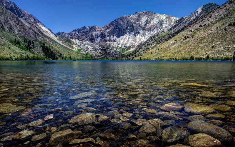 Clear lake in mountain valley