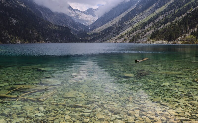 Clear lake in mountain valley