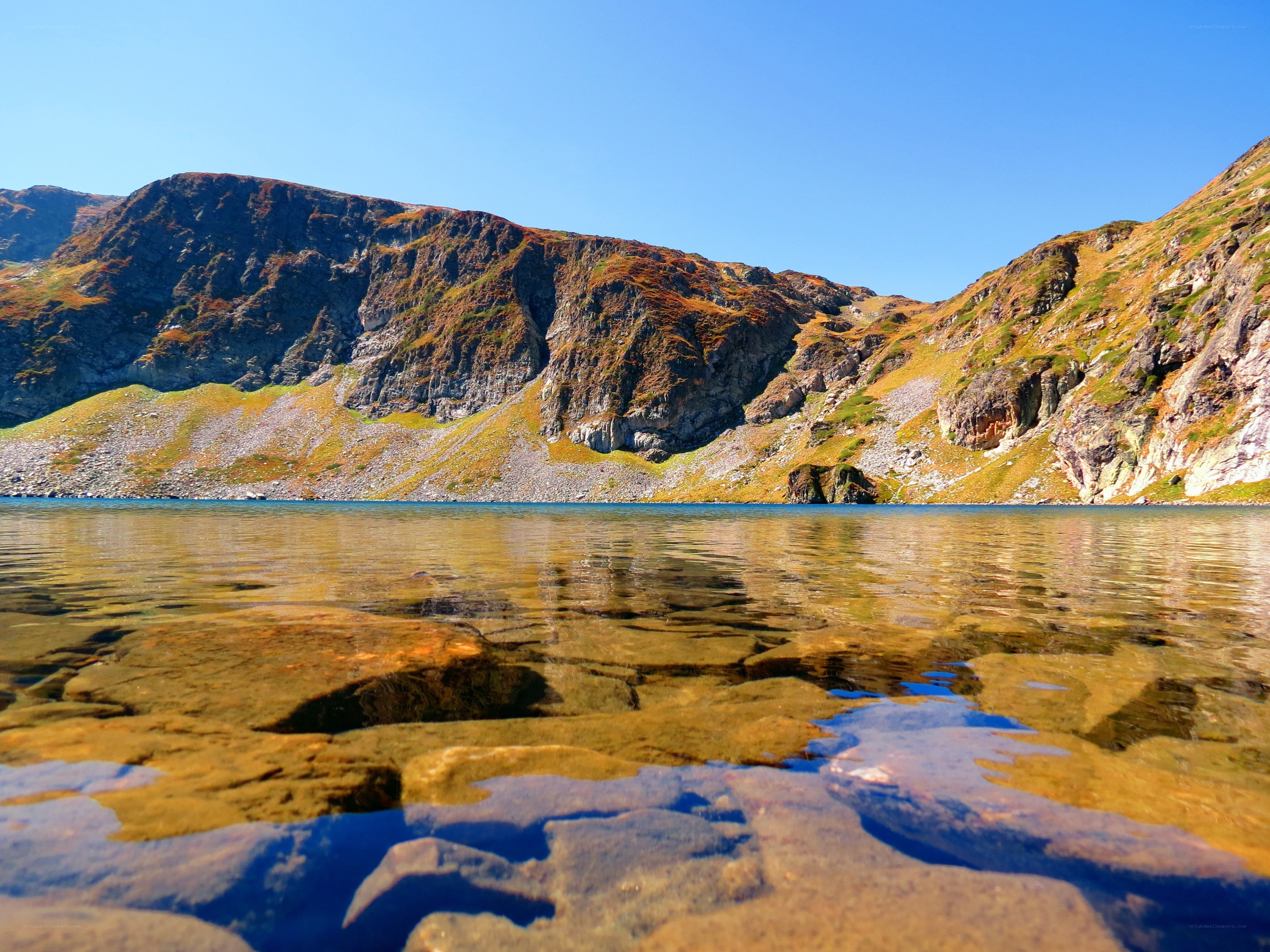 Clear lake in mountain valley