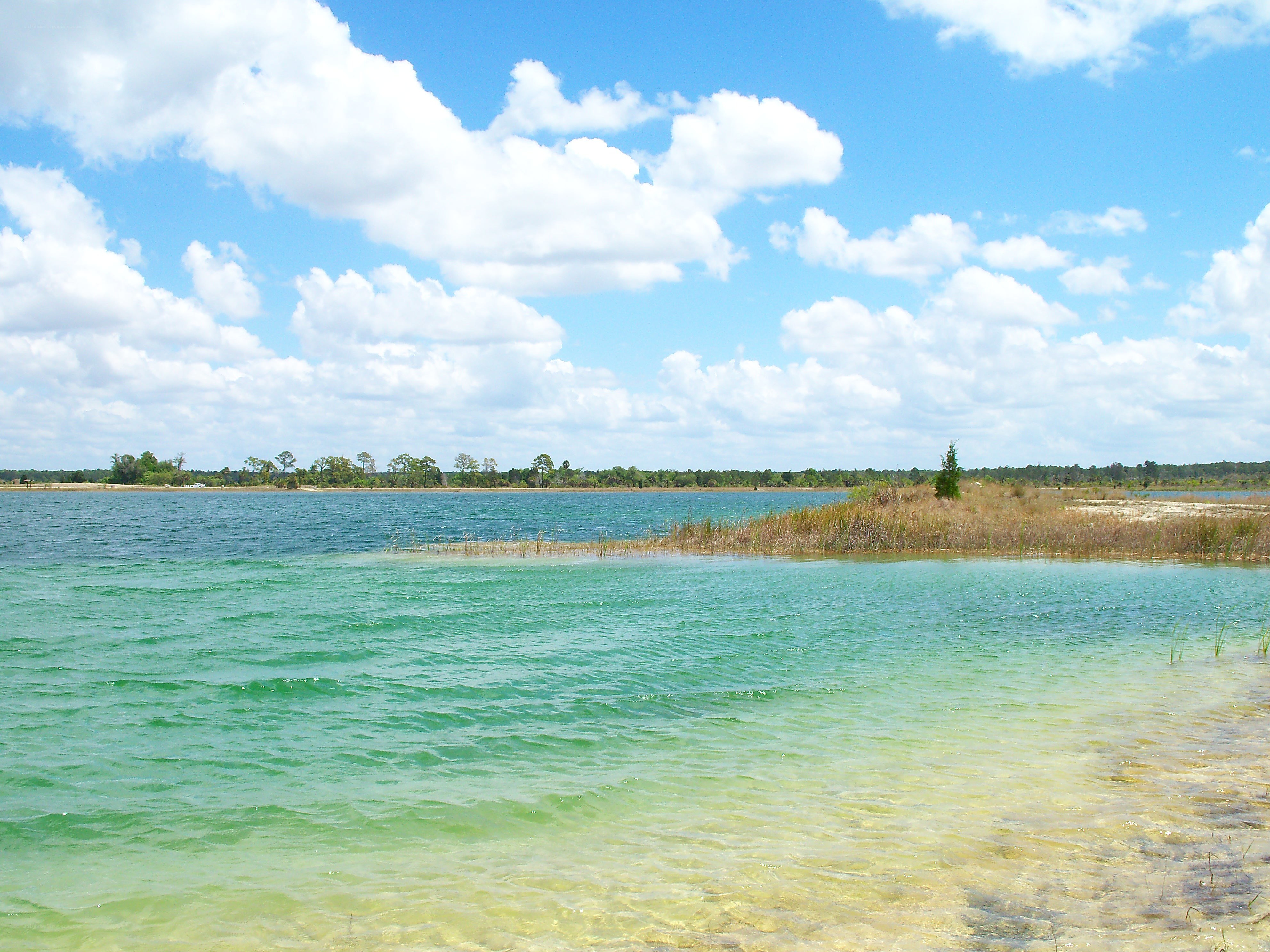 Clear lake with blue sky